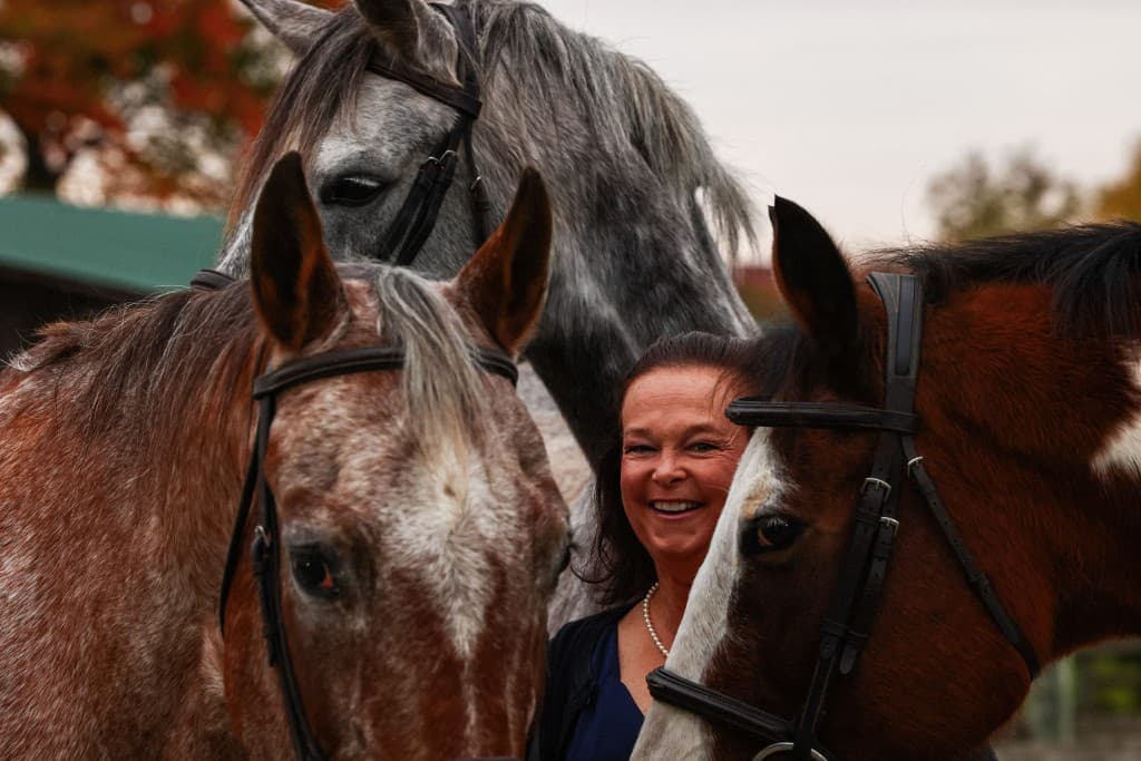 Bevin Nicholson with her horses at C'est Chevaux